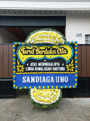 Papan Bunga Duka di Lolu Selatan